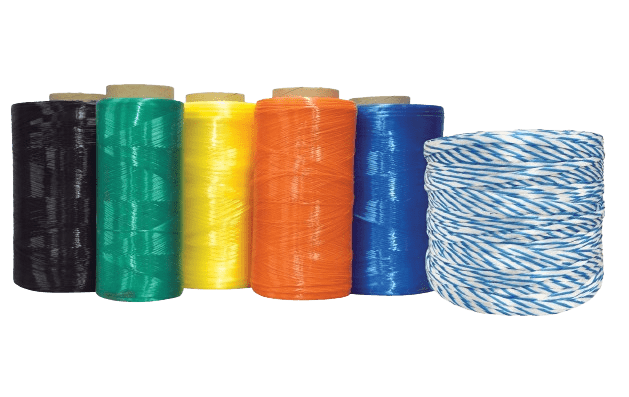 a collection of spools of thread in various colors